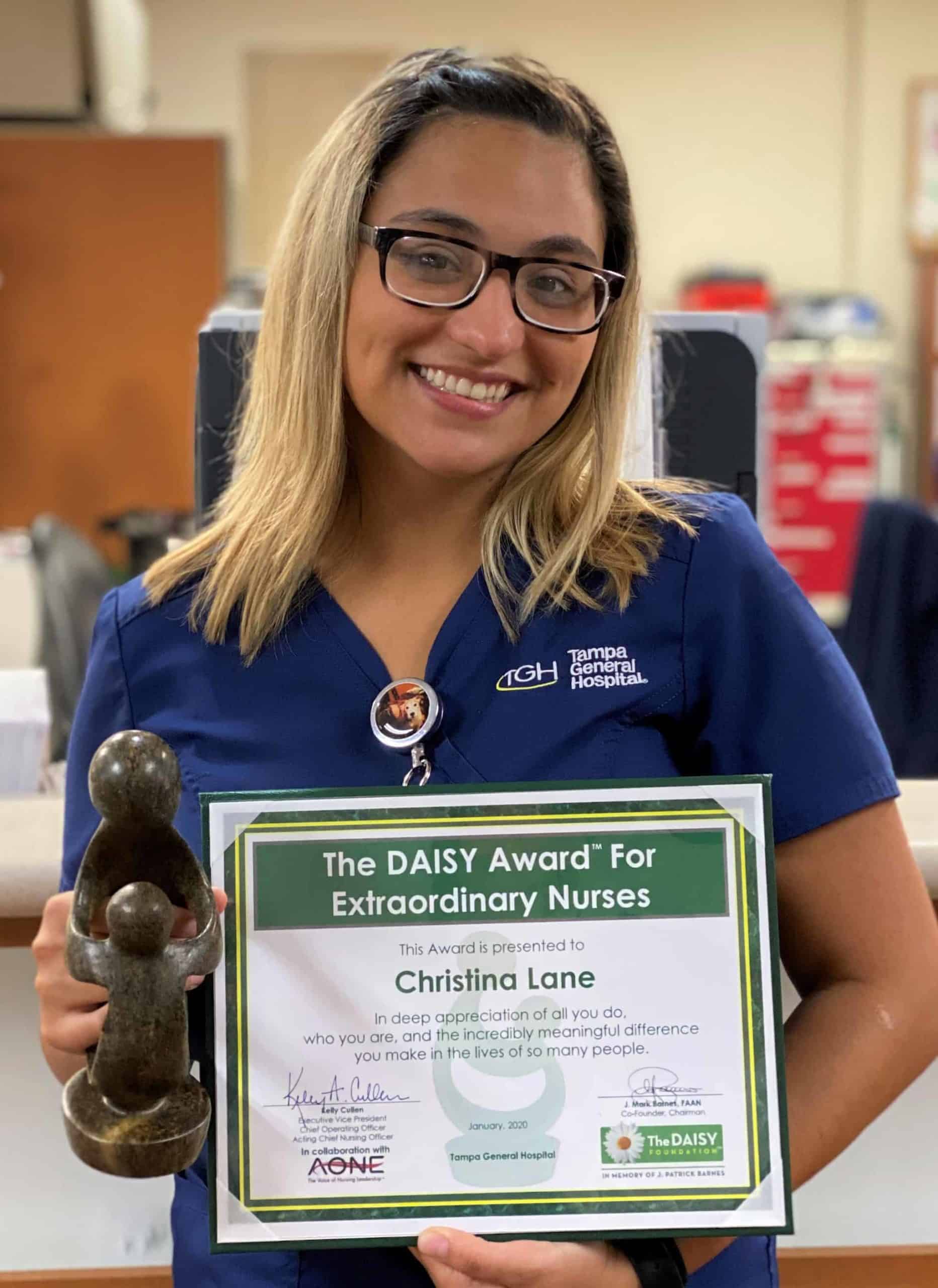 Nurse Christina Lane receiving The Daisy Award for being a compassionate advocate